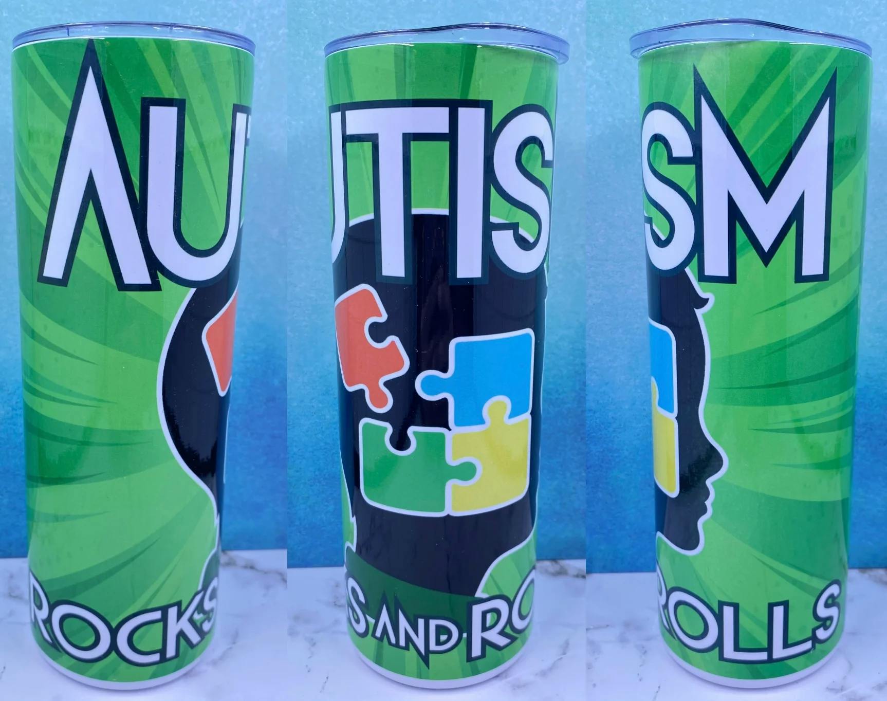 Autism Rocks and Rolls tumbler. Entire tumbler displays the Autism Rocks and Rolls logo.